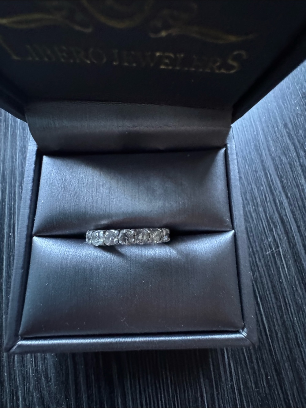 Platinum Band with 9 diamonds (0.90 carat total) Size 5 Ring. 4.9 grams